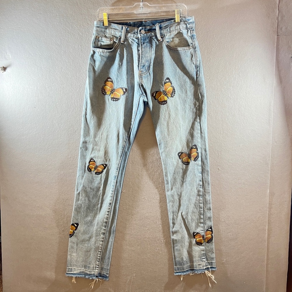 683 | MNML Butterfly Graphic Raw Hem Straight Leg Jeans Light Wash Blue 30